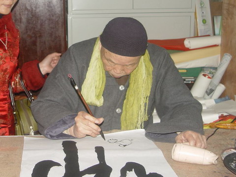 圆霖大师书法时-1.jpg