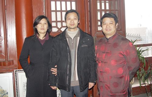 与周广中夫妇合影.JPG